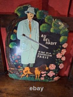 Ancienne Plaque publicitaire en tole peinte Au bel habit