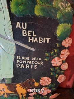 Ancienne Plaque publicitaire en tole peinte Au bel habit