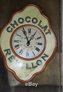 Ancienne pendule chocolat revillon en tole peinte pas plaque émaillée