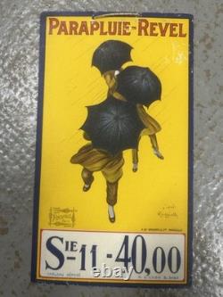 Ancienne plaque publicitaire en tôle PARAPLUIE REVEL d'après CAPPIELLO 1922
