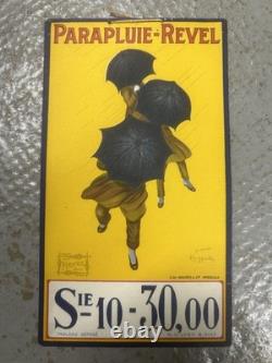 Ancienne plaque publicitaire en tôle PARAPLUIE REVEL d'après CAPPIELLO 1922