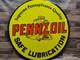 Plaque en métal émaillé porcelaine Pennzoil taille 30 pouces ronde