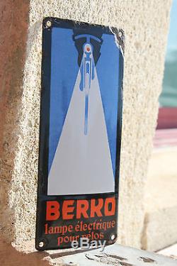 Rare plaque de propreté émaillée bombée publicitaire Berko lampe pour vélos